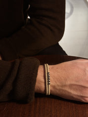 bracelet cordon beige modèle five photo porté homme marque AGALINO